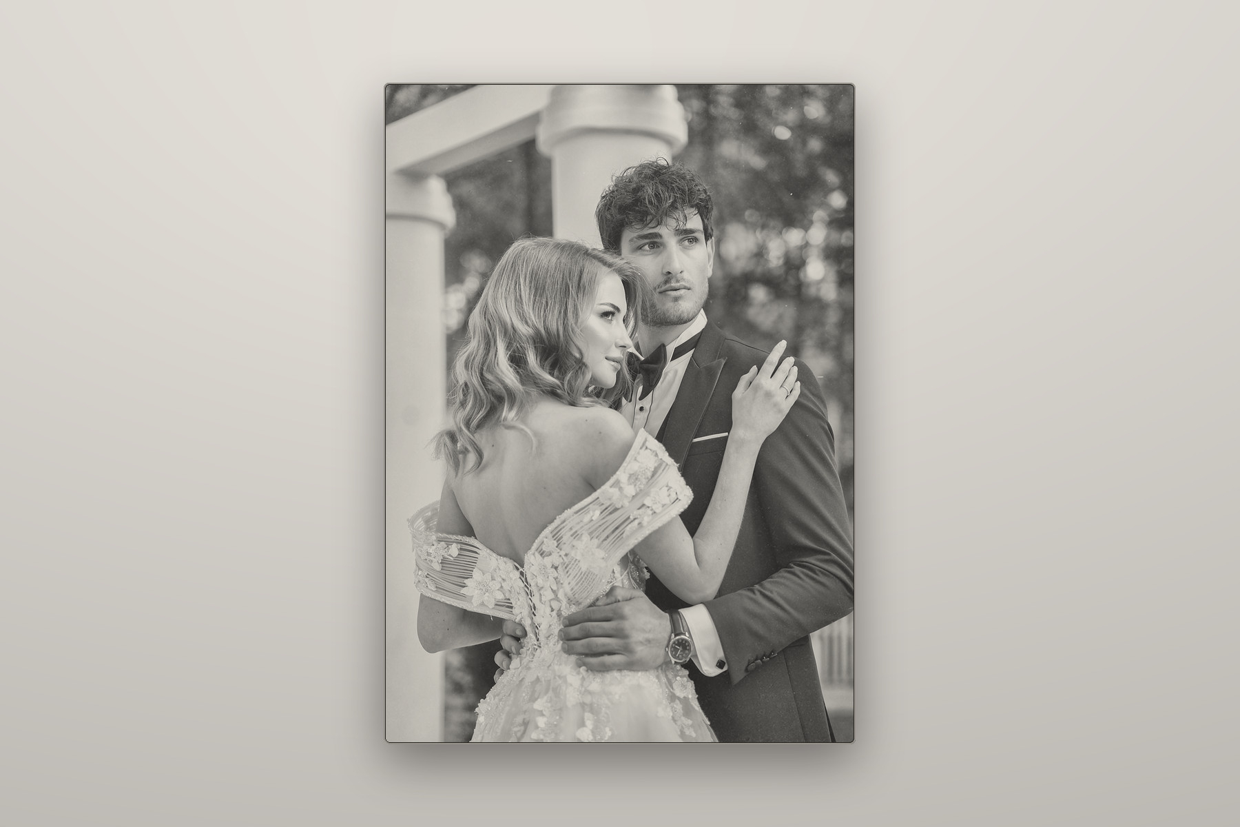 A photograph engraved into black anodised steel