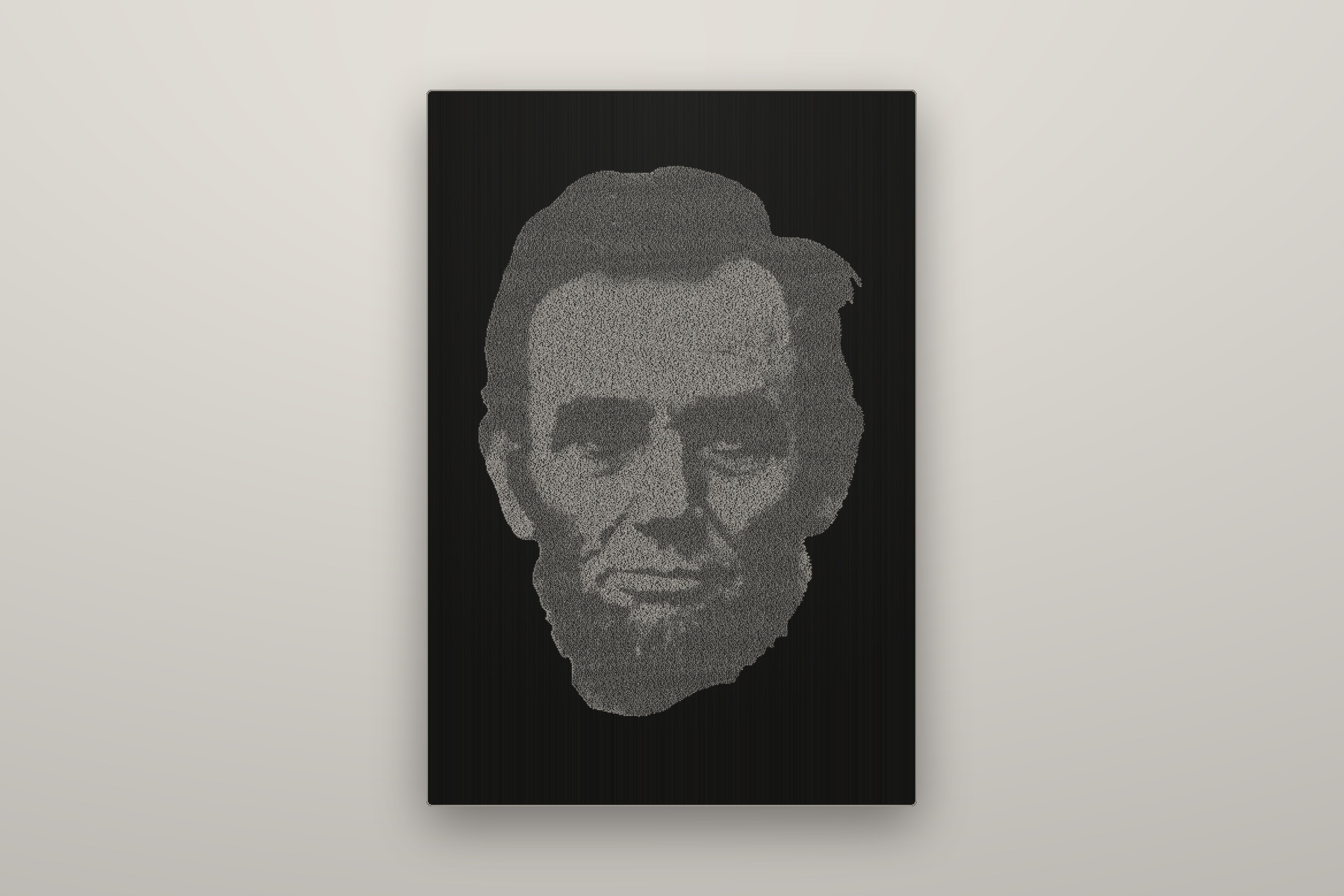 In Memoriam — text portrait in anodised